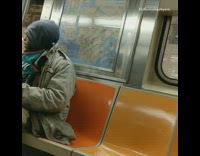 Guy green jersey smokes  weed on subway train