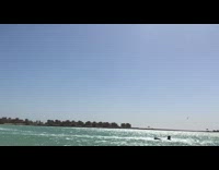 Guy lets go of parasail handle while in the air 