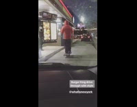 Man goes through Burger King drive thru on hoverboard 