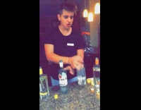 NSFW MUSIC guy drinks and swigs three different types of new amsterdam and one type of bacardi