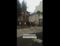 Person black underwear walking shirtless with black mask street new york