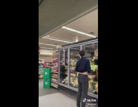Guy dance grocery store frozen foods 