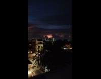 Huge lightning crawl upwards night sky clouds