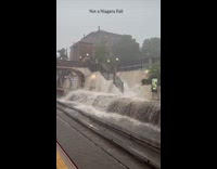 Street flood pours into subway like waterfall