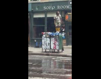 Collab winy - Man climb on pole to attach USA flag