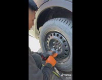 Dipping hotdog into cup of sauce condiments