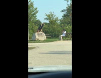 Collab IITW - Shirtless man try handstand over large rock
