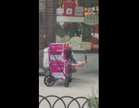 Bald guy selfie cart two pink boxes