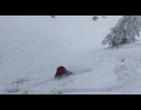 Collab JerrySlams - Skier red jacket trips over snow and tumbles forward in front of ski lift