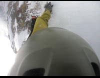 Man falls climbing down mountain from skiing