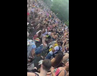 Crowd of people jump in fountain to celebrate pride 
