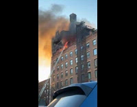 Building roof on fire with black smoke Part 4