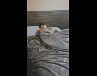 Dad pretends baby isnt in bed with him