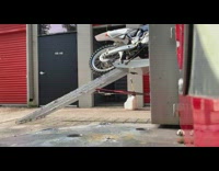 Lady Loading Dirtbike on Ramp Fail 