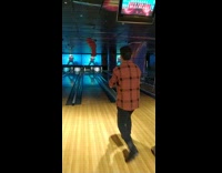 Man attempts to strike bowling ball but slipped on his hand