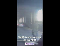 Guy bikes on the FDR