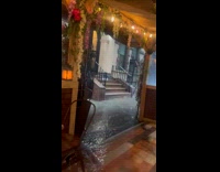 Collab WINY - Rain flood flows inside outdoor restaurant NYC