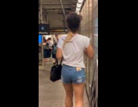 Collab Subway Creatures - Woman white shirt lizard on shoulder subway