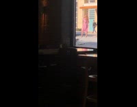 Woman long pink coat street picture