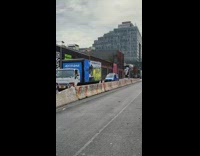 Person walks wear giant shirt costume at road NYC 