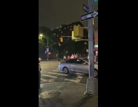 Shirtless guy dances ballet crosswalk cars honk 