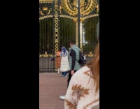 Woman spin and crouch at the gate