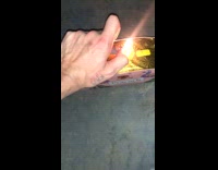 Man lights fireworks in backyard with dogs