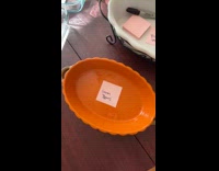 Serving bowls and plates labelled with Thanksgiving food