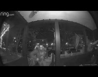 two guys exit house hear noise and run inside