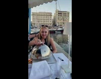 Guy proposes at restaurant 