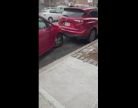 Smart car poorly parked in parallel parking spot