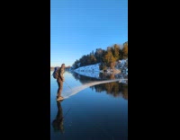 Two guys shows braking skills while skating
