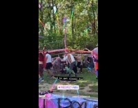 People Dance and Spin with Ribbons at Park 