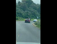Collab IITW - Three women on the car window takes picture while on the road