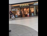 Man with dwarfism plays basketball with random people at the mall