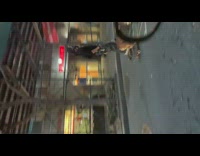 Guy holding paper bag skateboards with dog