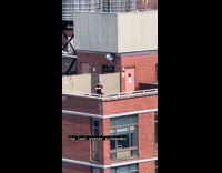 Man doing karate moves on rooftop pt. 1