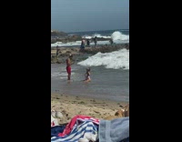 Woman white bikini photo shoot ocean waves fail