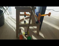 Rube goldberg machine white ball DDOI logo 