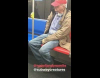 man red hat eats chicken nuggets from pocket