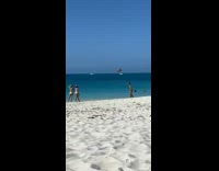 Red speedo jump pose beach yellow pt. 3