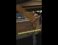 Bicycle bridge car white shirt black backpack 