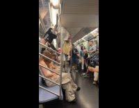 Woman flailing over handrails on subway