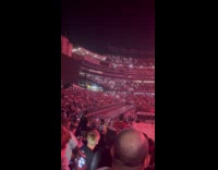 Crowd does light wave from phone flashlights