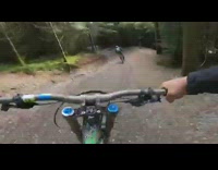 Biker rides over hilly trail until crash 