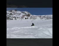 Skier backflips off ramp, lands on tip of skis, and scorpions