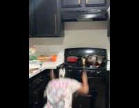 Woman dances catches onion with a knife