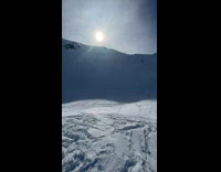 Collab SendItOfficiall - Man ski jumps from the snow ramp with a long airtime