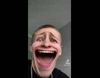 Guy laughs at funny filter big mouth