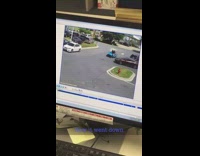 Red car forces blue golf cart into parked white car